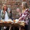 Two People Enjoying a Wine and Cheese Pairing